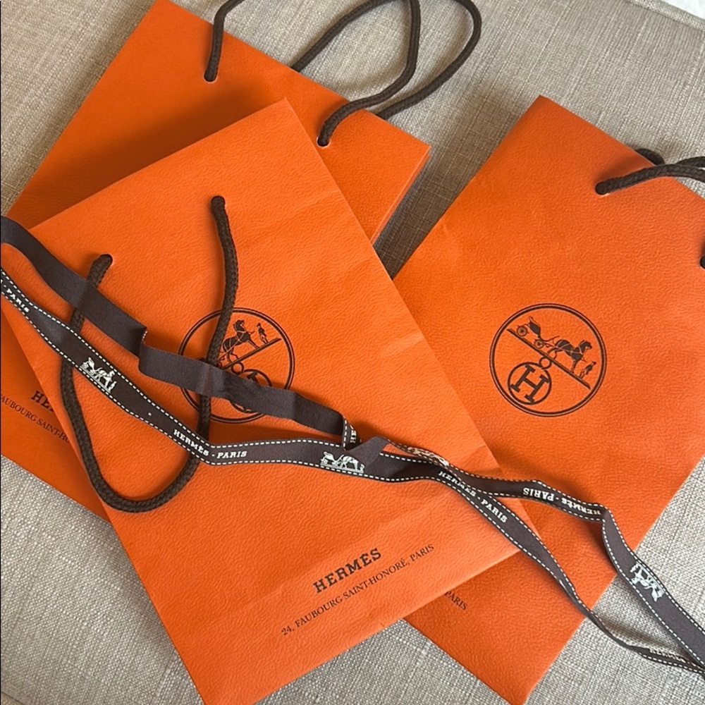 3 Hermes shopping bags (small) and a ribbon